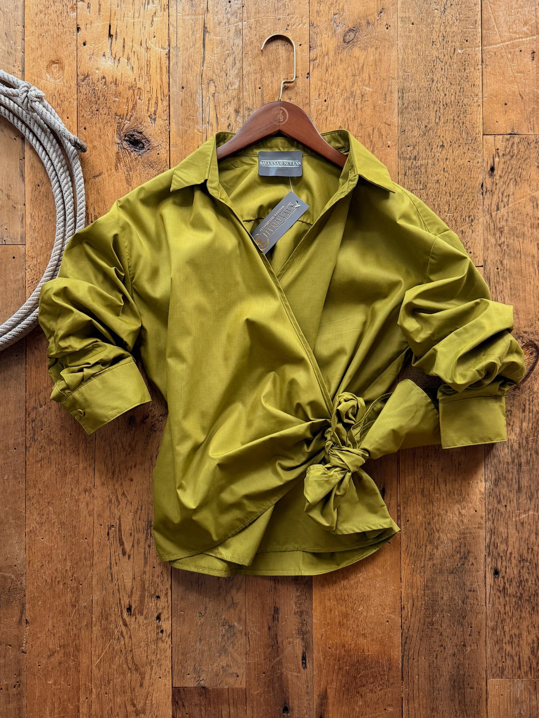 Altamont Chartreuse Wrap Top in a chartreuse cotton blend with a wrap-style, 3/4 sleeve design and a side tie closure.