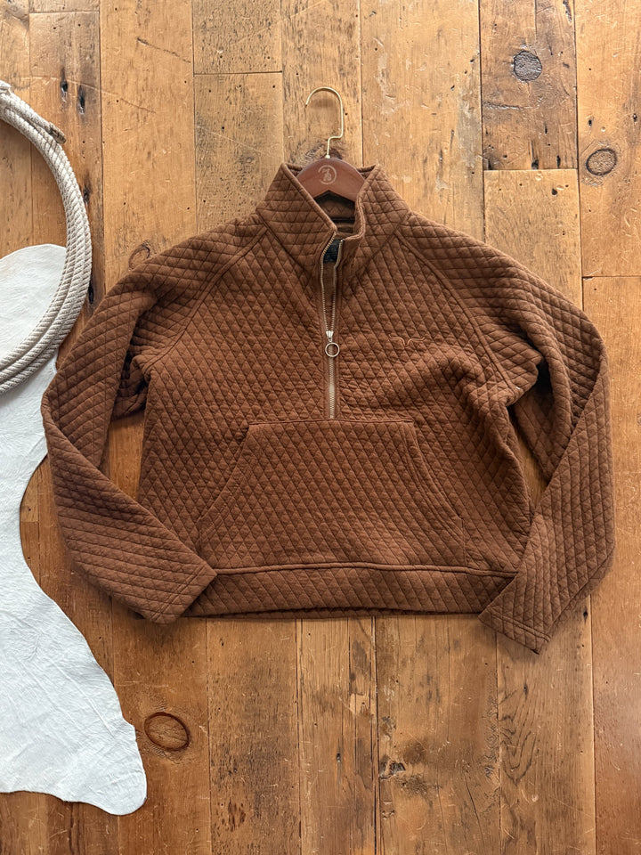 Caddo Chocolate Quilted Pullover in chocolate featuring a quilted texture, quarter-zip neckline, and front kangaroo pocket.