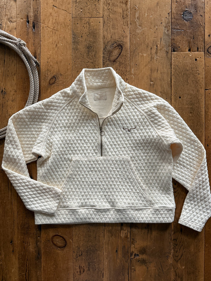 Caddo Cream Quilted Pullover in a cream-colored quilted cotton blend featuring a quarter-zip neckline and a front kangaroo pocket.