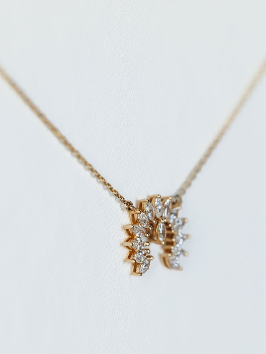 A close-up of the Savannah Sevens western life{&}style Diamond Naja Necklace, featuring a pendant with sparkling lab grown diamonds in a semi-circular sunburst pattern, displayed against a plain white background.