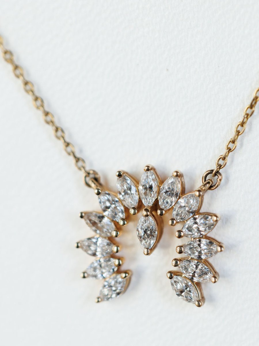 The Diamond Naja Necklace by Savannah Sevens western life{&}style features a crescent pendant with marquise-cut lab grown diamonds displayed against a white background.