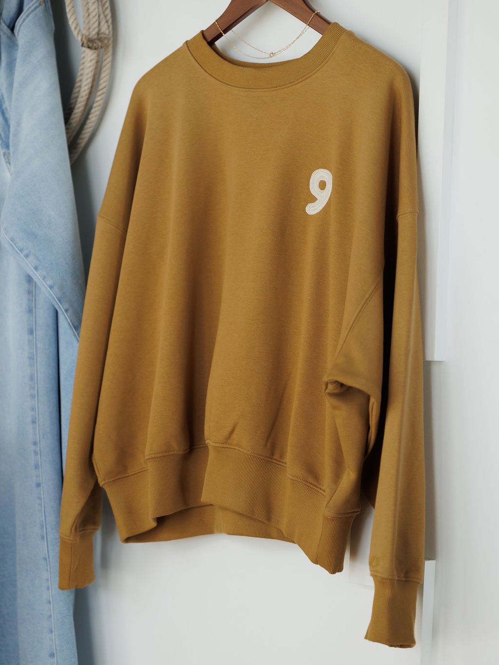 Dreams Embroidered Long Sleeve Pullover