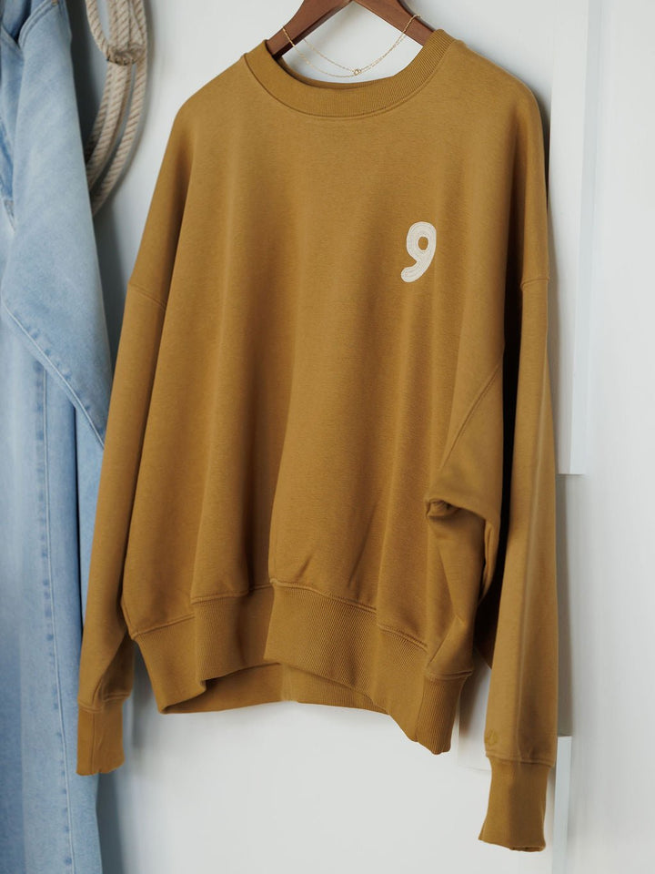 Dreams Embroidered Long Sleeve Pullover