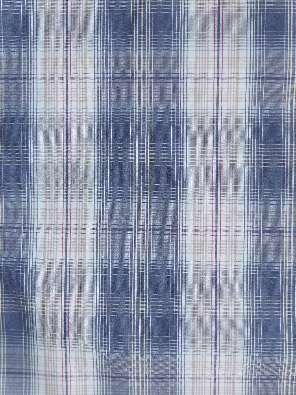 The Durand Ariat Men's Plaid Button Up by Savannah Sevens western life{&}style features blue, white, and gray plaid with red and yellow lines, offering moisture wicking and sun protection—perfect for a classic men's shirt.