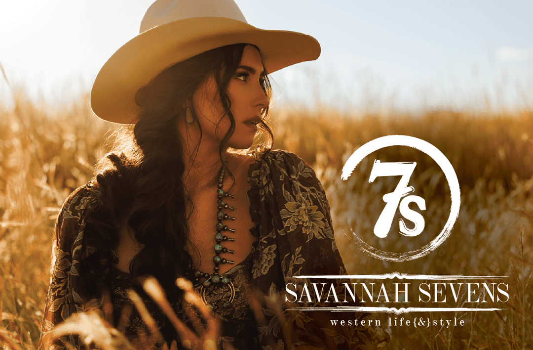 A woman in western attire stands in a sunlit field. The Savannah Sevens western life{&}style logo is shown, highlighting the Gift Card {email version} as the perfect present.