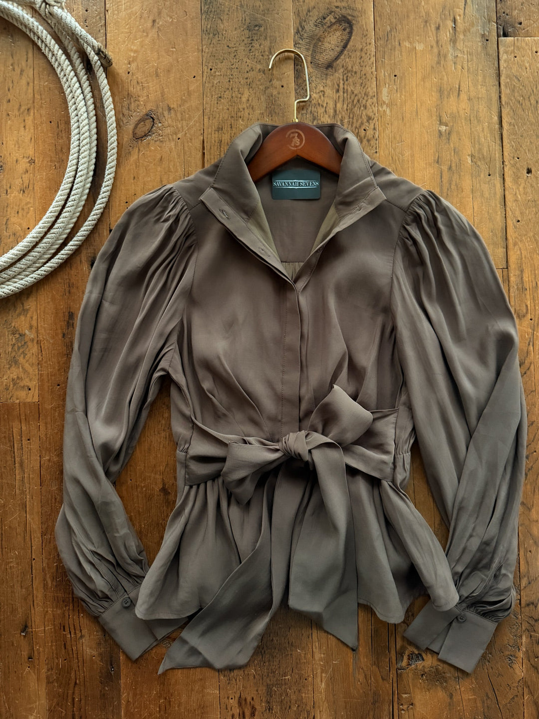 Laverne Mocha Balloon Sleeve Top in mocha with long balloon sleeves, a waist-cinching tie belt, and a relaxed fit.