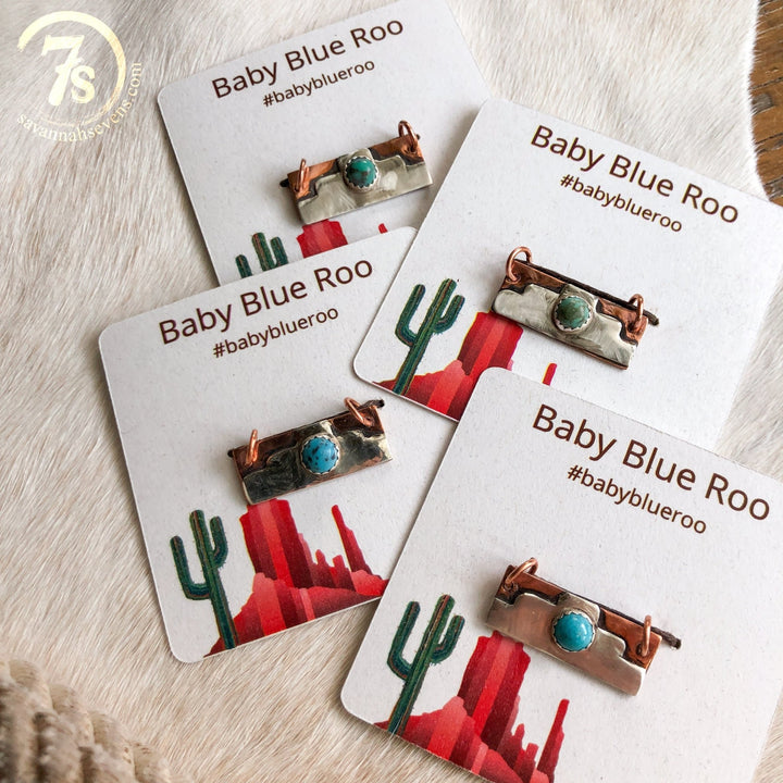 Four Palco Shoe Tag cards from Savannah Sevens western life{&}style, each featuring a metal shoe tag with Southwestern design and cactus illustrations, are arranged on a white fur surface.