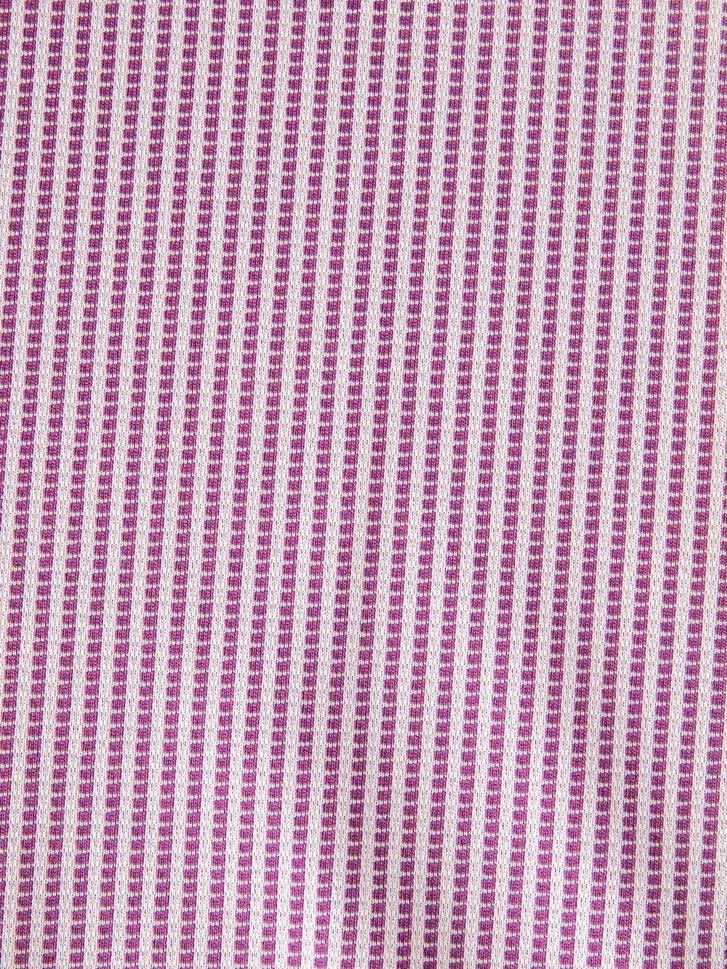 Close-up of the Payden Burgundy Striped Polo by Savannah Sevens western life{&}style, featuring stretchy fabric with evenly spaced vertical burgundy and white stripes. The texture is clearly visible, highlighting its quality and style.