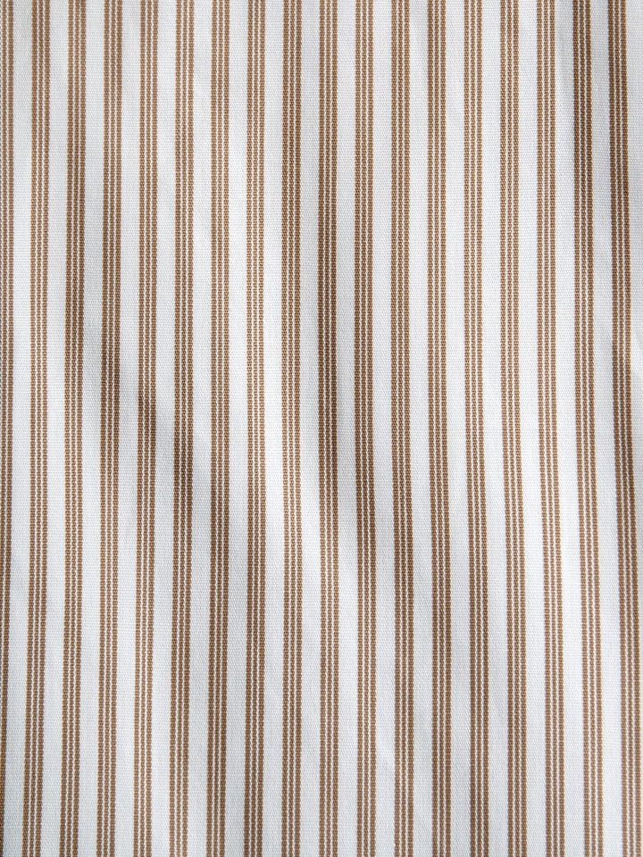 Close-up of the Steger Cinch Men's White Pinstripe Button Up by Savannah Sevens western life{&}style, featuring modern fit cotton with evenly spaced vertical brown and white stripes and a textured, slightly wrinkled finish.