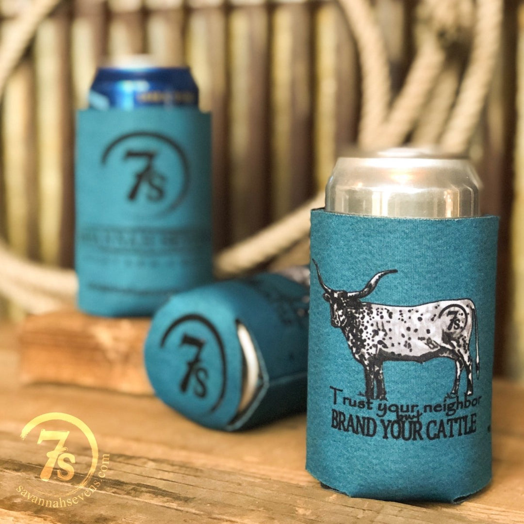 Three Brand Your Cattle Koozies in teal from Savannah Sevens western life{&}style keep your drinks cold in Western Chic style, featuring a longhorn cow, "Trust your neighbor, BRAND YOUR CATTLE," the 7s logo, and distinctive flair.